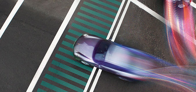 Car at a city intersection